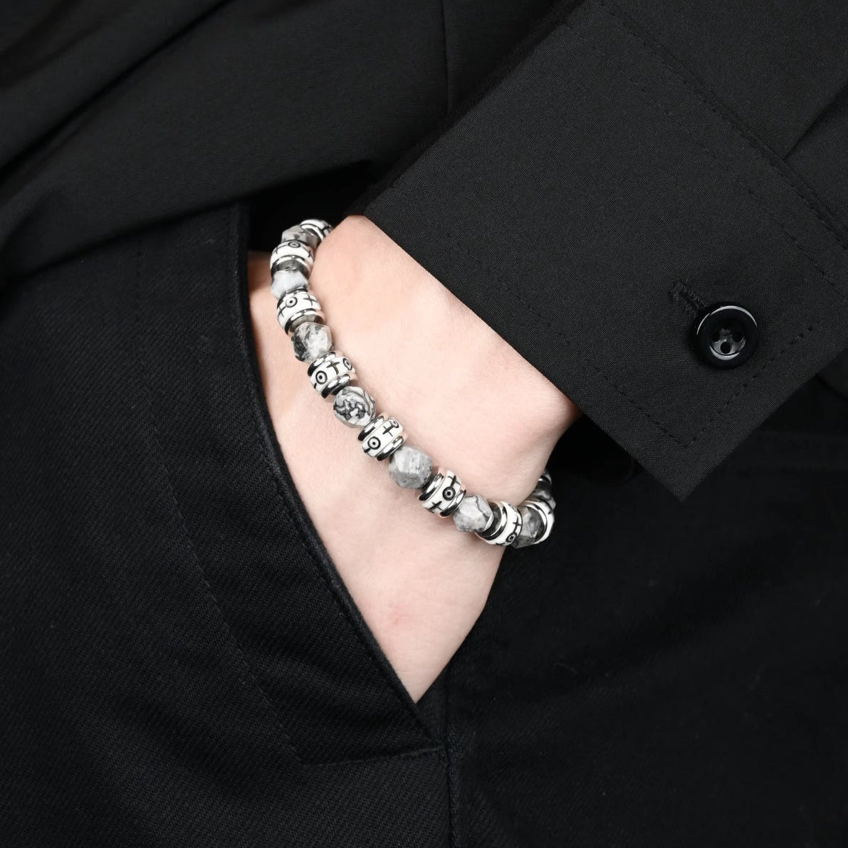 Close-up of Obsidian and Tiger Eye beads showing natural texture and polish