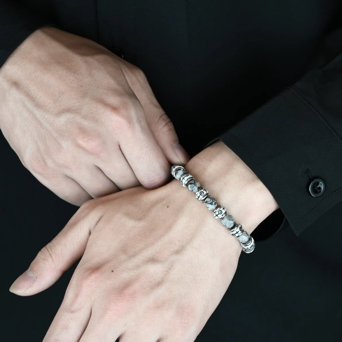 Mens beaded bracelet worn on wrist with natural stone shine