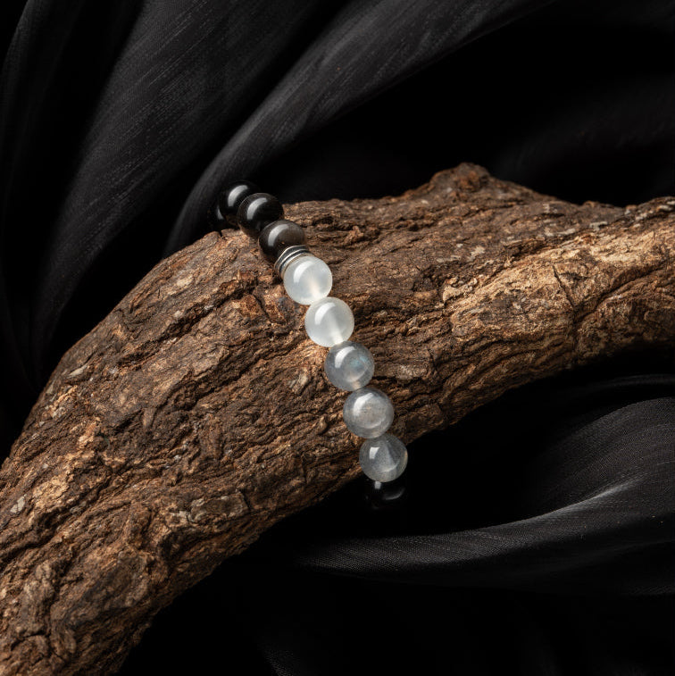 Moonstone and silver obsidian beaded bracelet for chakra healing and energy balance
