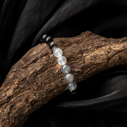 Moonstone and silver obsidian beaded bracelet for chakra healing and energy balance
