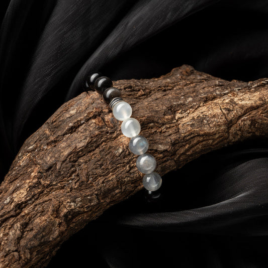 Moonstone and silver obsidian beaded bracelet for chakra healing and energy balance
