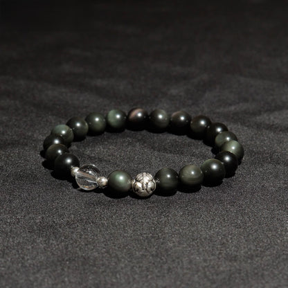 Front view of obsidian Pixiu healing stone bracelet with quartz crystal beads